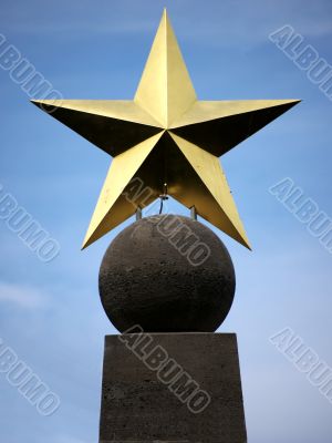 Gold star and globe Gold star and globe