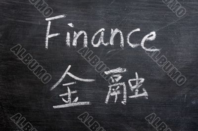 Finance - word written on a smudged blackboard Finance - word written on a smudged blackboard