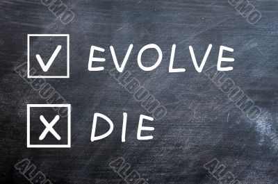 Evolve or die check boxes on a smudged blackboard
