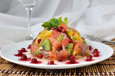 Fruit salad with salmon and pomegranate Fruit salad with salmon and pomegranate