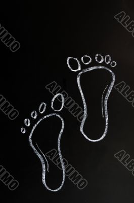 Footprints drawn with chalk