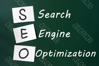 Acronym of SEO - Search engine optimization written on a blackboard 