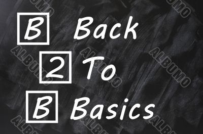 Acronym of B2B for Back to basics written on a smudged blackboard Acronym of B2B for Back to basics written on a smudged blackboard