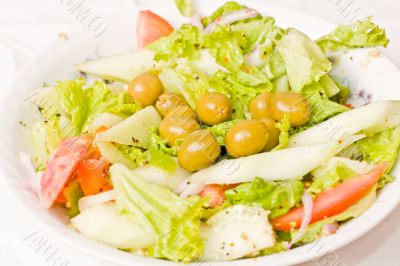 Tasty salad served in a bowl