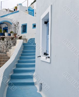 White buildings and blue staircase