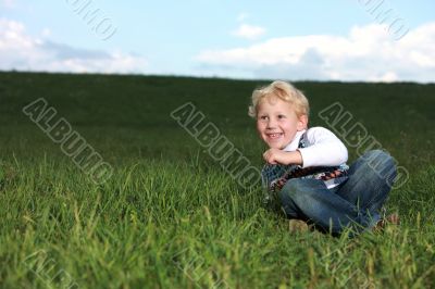 Small boy having a good laugh