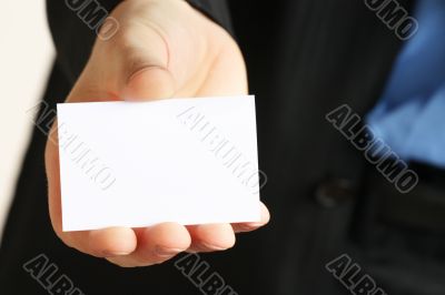 card presented by a business man