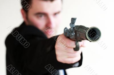 young man with gun