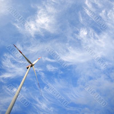 Windmill against blue sky with copy space