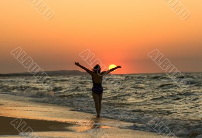 Young woman in a sunset Young woman in a sunset