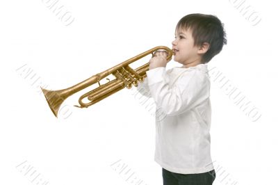 Boy playing on a trumpet Boy playing on a trumpet