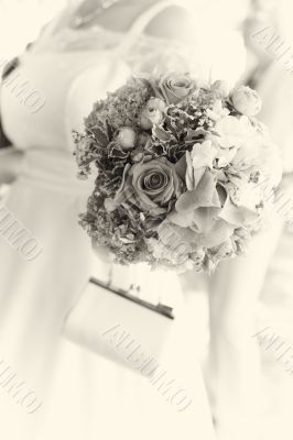 Bride carrying her bouquet