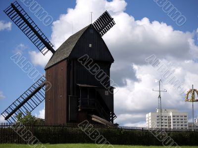 Bock windmill Marzahn and block of houses Bock windmill Marzahn and block of houses