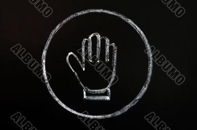 Chalk drawing of stop symbol on blackboard background