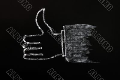 Chalk drawing of thumb up sign on blackboard background