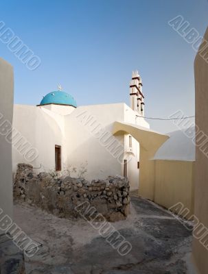 Emporio village street with church and belltower