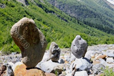 Balanced stones near the caucasus mountain river