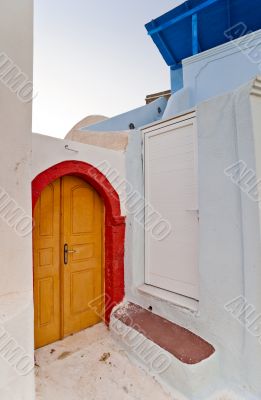 Corner of the street with yellow door