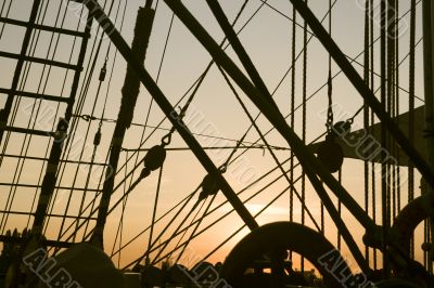 Ship`s rigging in the sunset