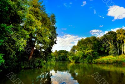 The river among the green shores The river among the green shores