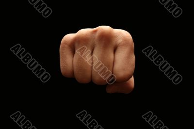 A man fist isolated on black background
