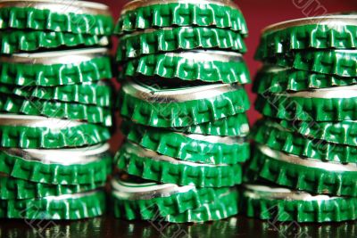 pile of green beer caps