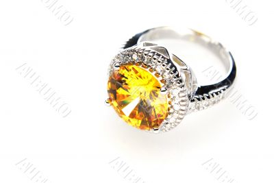 Ring with orange stone