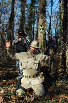 soldier aiming terrorist