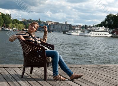 girl sitting in the pier