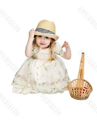 little girl in a straw hat with a basket woven