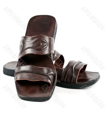 a pair of leather slippers for men