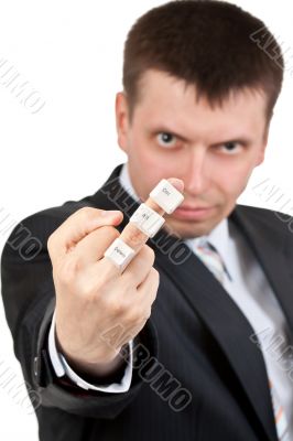 businessman shows Fuck. On the finger keys Ctrl Alt Del