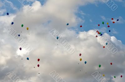 colored balloons flying in the sky