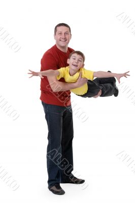 Dad keeps his son in his arms