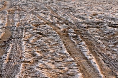 trail from the car on the frozen sand