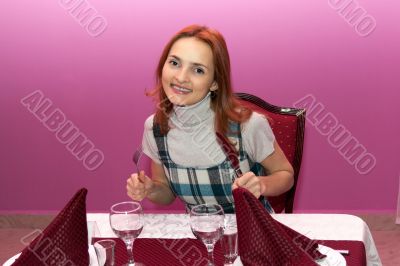 Beautiful girl in a restaurant