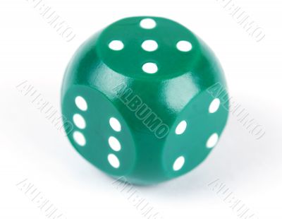 green plastic dice