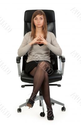 girl sitting in a chair