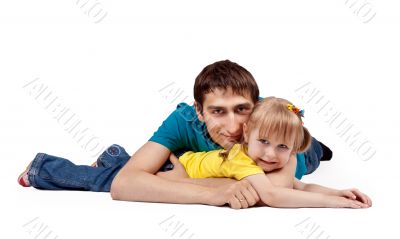 dad and little daughter lying on the floor