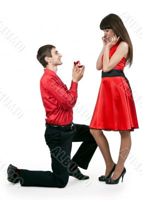 man gives the woman a ring
