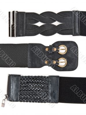 Three black leather women`s belt