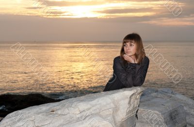 girl against the sea at night