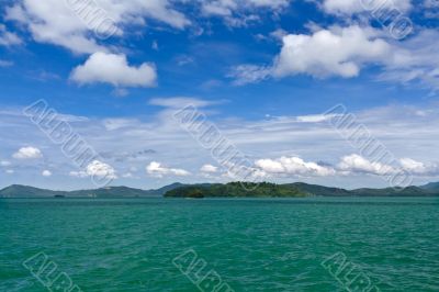 Landscape of palm island on the horizon in the Andaman Sea