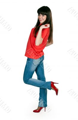 girl in red clothes and blue jeans in the studio