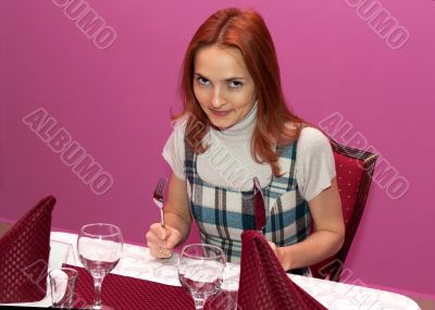Beautiful girl in a restaurant