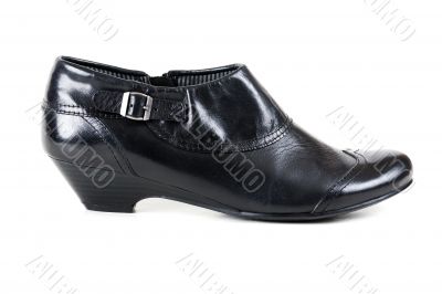 one black leather women`s shoes