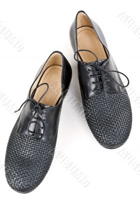 stylish pair of black leather shoes