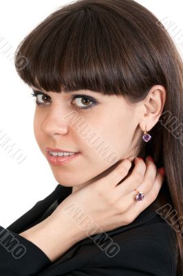 portrait of a beautiful brunette girl with jewels