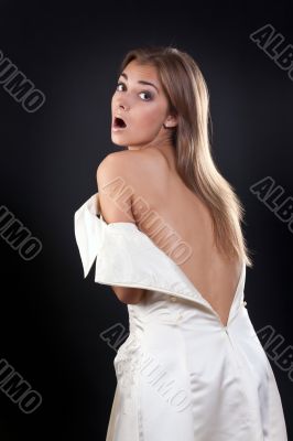 pretty girl with bare back in the studio