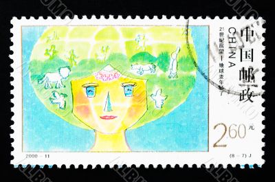 CHINA - CIRCA 2000: A Stamp printed in China shows the earth becoming younger, circa 2000